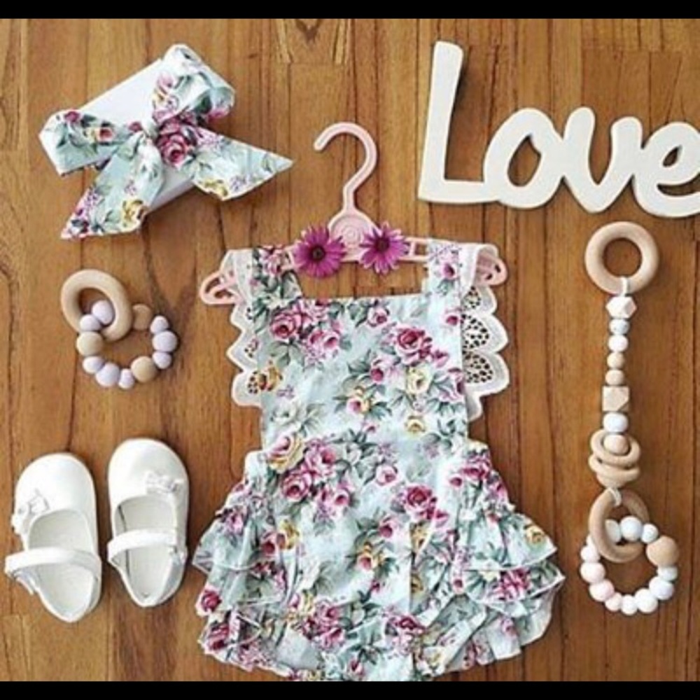 Kids romper outfit with matching headband.